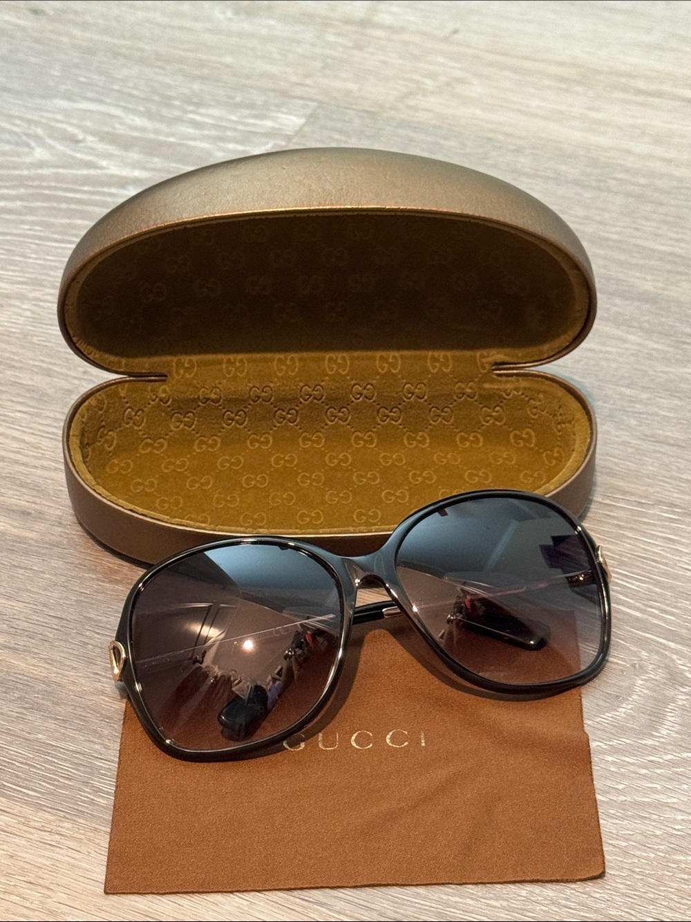 Gucci Black Lens Sunglasses with Gold Temples